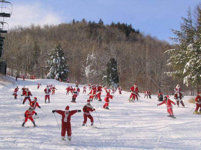 If one Santa skiing doesn't make you smile, how about 250? That's what you get on Santa Sunday at Sunday River in Maine. 